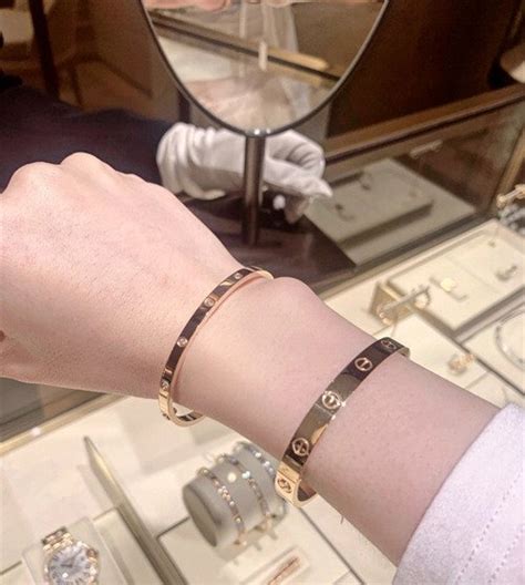 cartier love bracelet on wrist - comparable cartier love bracelet.